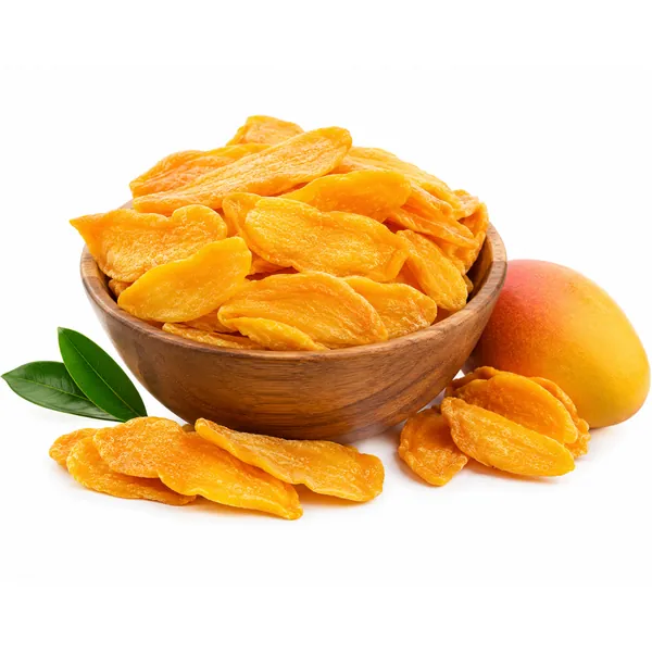 Dried mango slices in a wooden bowl with fresh mango and leaves — VKRUND ENTERPRISE, dried mango exporter from India